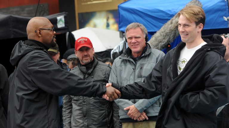 Samuel L. Jackson, director Joe Johnston and Chris Evans filming on location for "Captain America: The First Avenger" on the streets of Manhattan on April 23, 2011 in New York City.